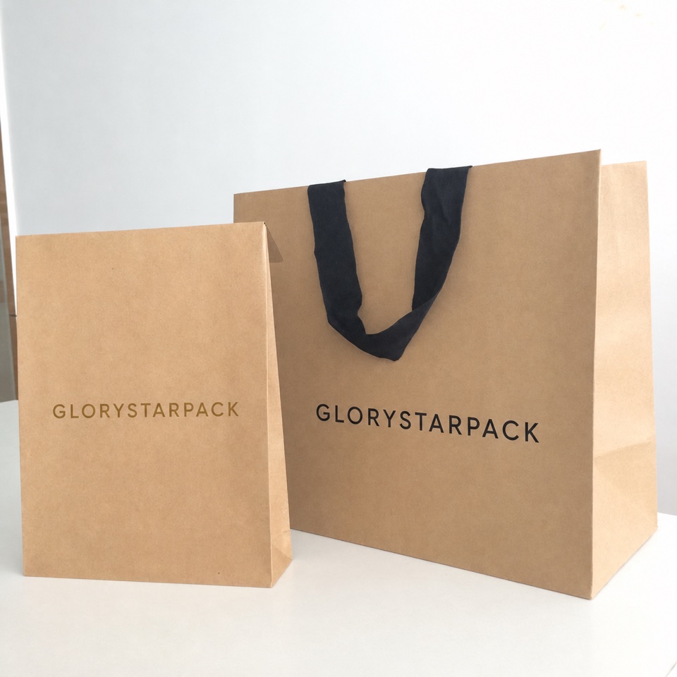 Two kraft paper bags branded GloryStarPack