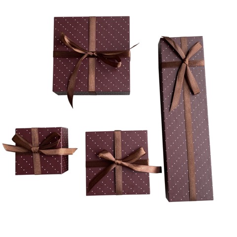 Burgundy paper gift box set tied with ribbon